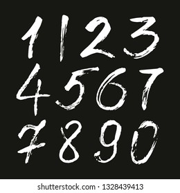 Set of calligraphic numbers painted by white  brush on isolated black background. Lettering for your design. Vector illustration.