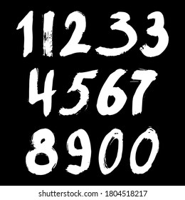 Set of calligraphic numbers painted by white  brush on isolated black background. Lettering for your design. Vector illustration