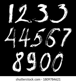 Set of calligraphic numbers painted by white  brush on isolated black background. Lettering for your design. Vector illustration