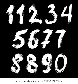Set of calligraphic numbers painted by white  brush on isolated black background. Lettering for your design. Vector illustration