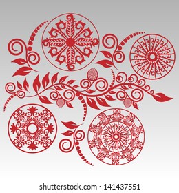 set of calligraphic patterns in red, curly plant