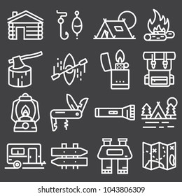 Set of camping equipment symbols and icons on gray background