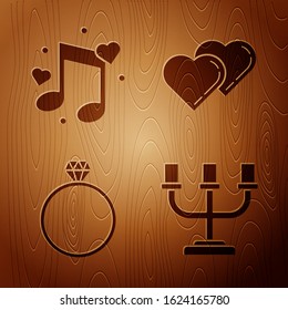 Set Candlestick, Music note, tone with hearts, Diamond engagement ring and Two Linked Hearts on wooden background. Vector