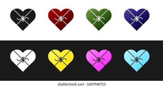 Set Candy in heart shaped box and bow icon isolated on black and white background. Valentines Day.  Vector Illustration