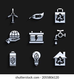 Set Car battery, Light bulb with leaf, Eco House recycling symbol, Water tap, Recycling plastic bottle, Human hands holding Earth globe, Paper shopping bag recycle and Wind turbine icon. Vector