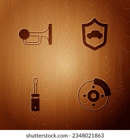 Set Car brake disk with caliper, Signal horn on vehicle, Screwdriver and shield on wooden background. Vector