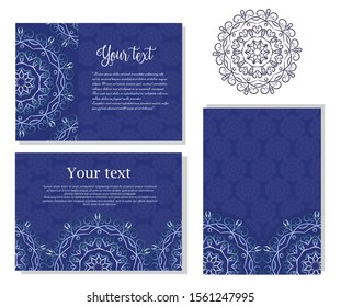 Set of cards with the image of a circular mandala on a blue background.