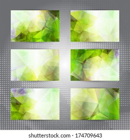 Set of cards with shining green abstract geometric polygonal pattern
