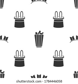 Set Carnival garland with flags, Popcorn in box and Magician hat and rabbit ears on seamless pattern. Vector