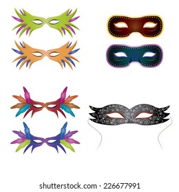 a set of carnival masks on a white background