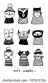 Set with cartoon cats muzzles. Hand drawn doodle kitty collection on white background. Vector illustration. 