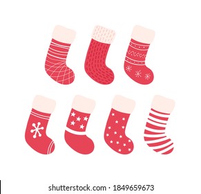 Set of cartoon christmas socks with decorations. New year colored stocking decorations. Element of funny celebration. Vector illustration isolated on white
