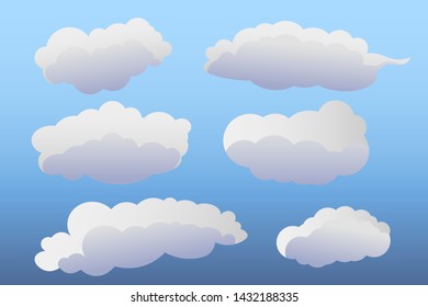 Set Of Cartoon Clouds With Various Forms Isolated On A Blue Summer Sky