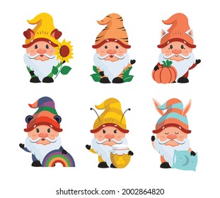 The set of cartoonish gnomes is good for holidays designs. The collection of funny stickers, logos. The vector illustration