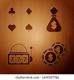 Set Casino chip with dollar, Playing cards, Slot machine with lucky sevens jackpot and Money bag on wooden background. Vector