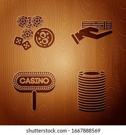 Set Casino chips, Casino chips, game dice and glass of whiskey with ice cubes, Casino signboard and Hand holding deck of playing cards on wooden background. Vector