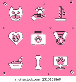 Set Cat, Hands with animals footprint, scratching post, Heart cat, Pet first aid kit, Dog award symbol, litter tray shovel and bone icon. Vector