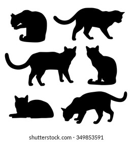 Set of cats silhouettes on a white background. Vector.