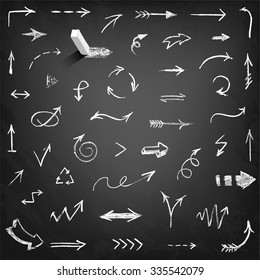 Set of chalk arrows isolated on black background