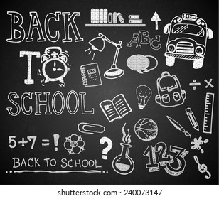 Set of chalk hand drawing BACK TO SCHOOL on blackboard