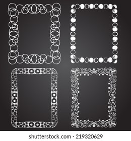 Set of chalk painted frames on a black chalkboard. Preform design.