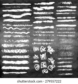 Set of chalk strokes, curved lines, banners and separators. Handmade design elements on chalkboard background. Grunge vector illustration.