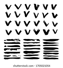 Set of check marks and straight lines drawn with thick black paint and brush isolated on white background.