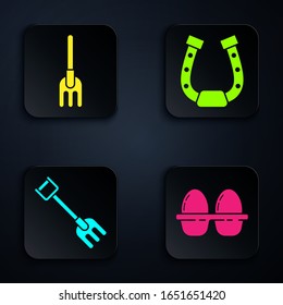 Set Chicken egg in box, Garden rake, Garden rake and Horseshoe. Black square button. Vector