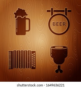 Set Chicken leg, Glass of beer, Musical instrument accordion and Street signboard with inscription Beer on wooden background. Vector