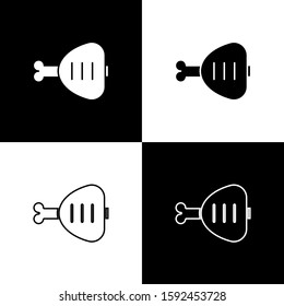 Set Chicken leg icon isolated on black and white background. Chicken drumstick.  Vector Illustration