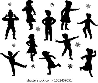 A set of children in silhouette playing having fun in Christmas or winter cold weather clothing