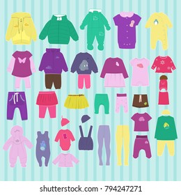 Set of children`s clothes on a striped background