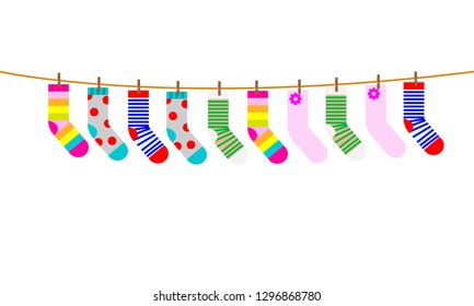 A set of children's socks are dried on a rope. Vector illustration.