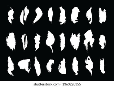 Set of Chinese ink mark. Freehand drawing. Chinese calligraphy strokes. White brush strokes. Vector illustration. Isolated on black back.