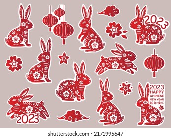 Set of Chinese New Year 2023 of the Rabbit stickers with red paper cut art. The Rabbit - Chinese zodiac symbol. (Translation : happy new year 2023, year of the Rabbit)