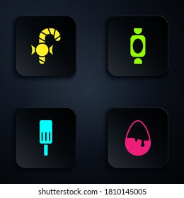 Set Chocolate egg, Christmas candy cane, Ice cream and Candy. Black square button. Vector