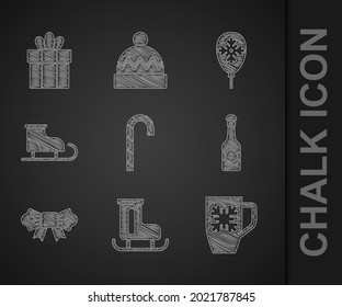 Set Christmas candy cane, Figure skates, Coffee cup with snowflake, Champagne bottle, Bow tie, Balloons and Gift box icon. Vector
