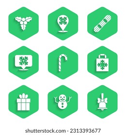 Set Christmas candy cane, snowman, Merry ringing bell, shopping bag, Gift box, Snowflake speech bubble, Snowboard and Branch viburnum icon. Vector