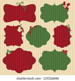 A set of Christmas cardboard labels in traditional red and green.