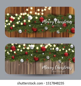 Set of Christmas cards. Green branches of fir tree with decor over wooden rustic background, Winter holiday design concept. Realistic vector illustration.