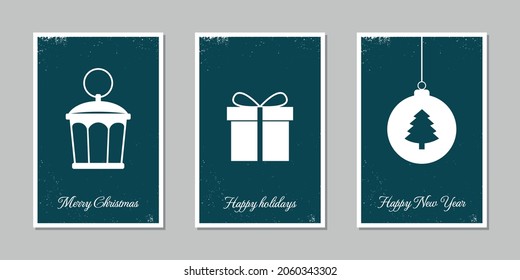 Set of Christmas cards with hanging ball decoration, lantern, tree, gift. A set of vintage frayed postcards. Flat design, vector illustration.