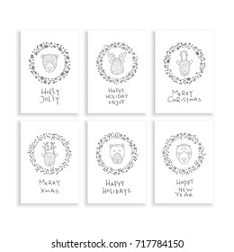 A set of Christmas cards. Vector Christmas wreath with cartoon animals isolated on white background