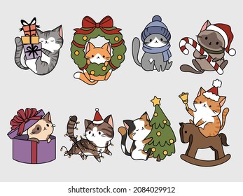 Set of Christmas cat. Collection of cute different holiday kitten with horn deer, tree toys, holiday costume. Happy New Year. Vector illustration for holiday cards.