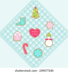 Set of Christmas cookies on checkered tablecloth