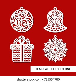 Set of christmas decoration: bell, gift, snowflake and ball. Templates for laser cutting, wood carving, plotter cutting or printing.