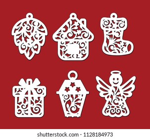 Set of Christmas decoration: fir-cone, house, xmas sock, gift box, lantern, angel. Template for laser cutting, wood carving. Vector silhouette on red background. Openwork ornate toy with lace ornament