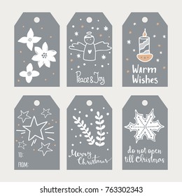 Set of Christmas gift tags with hand drawn decoration elements
