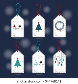 Set of Christmas Gift Tags with snowman, snowflakes, Christmas tree, ball and ornament in blue, turquoise, navy blue, white and red colors with navy blue background.