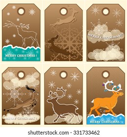 Set of Christmas greeting card with deers and snowflakes from the cardboard.