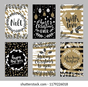 Set of christmas greeting cards with hand written greeting words and floral wreaths and branches and brush strokes on background
